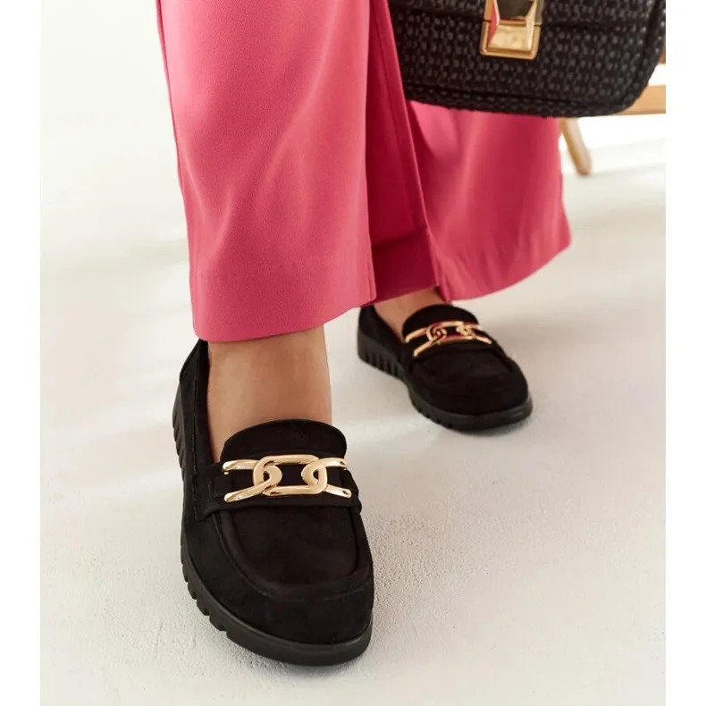 Black suede moccasins with a Sardis buckle