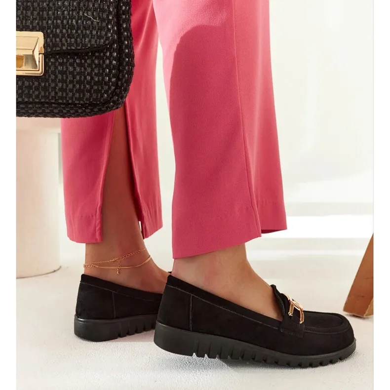 Black suede moccasins with a Sardis buckle